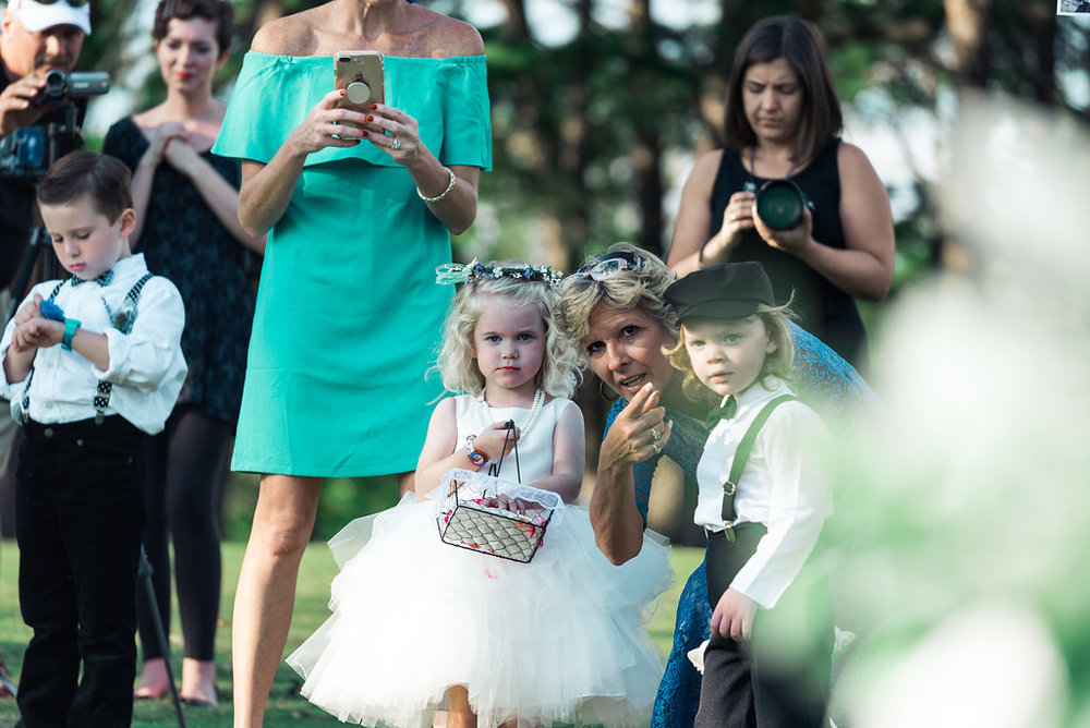 Cute ring bearer and flower girl in Pilot Knob Country Club. Wedding Photography by Party of Two Photography.