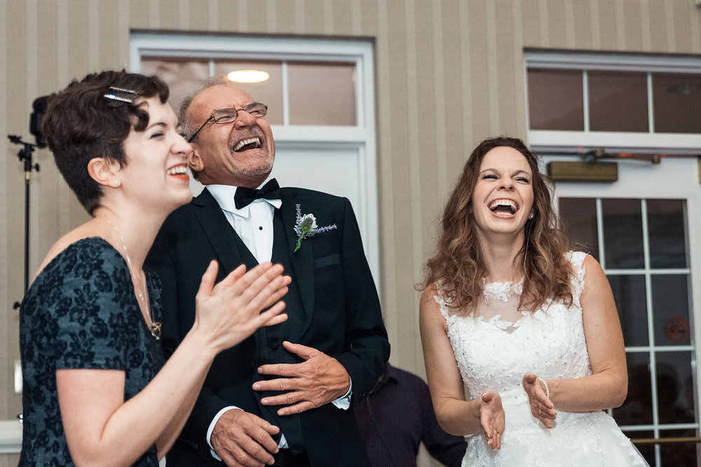 Reception shot of Bride grandfather laughing in Pilot Knob Country Club. Wedding Photography by Party of Two Photography.