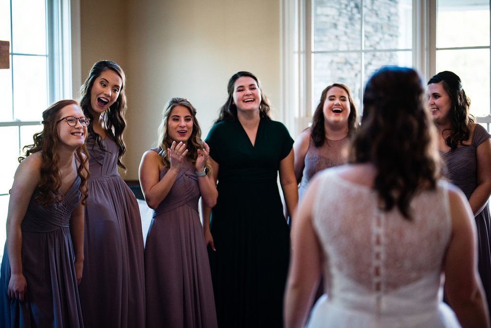 First Look with Bridesmaids at The Oaks at Salem Wedding in Apex, NC by Charlotte Wedding Photographers