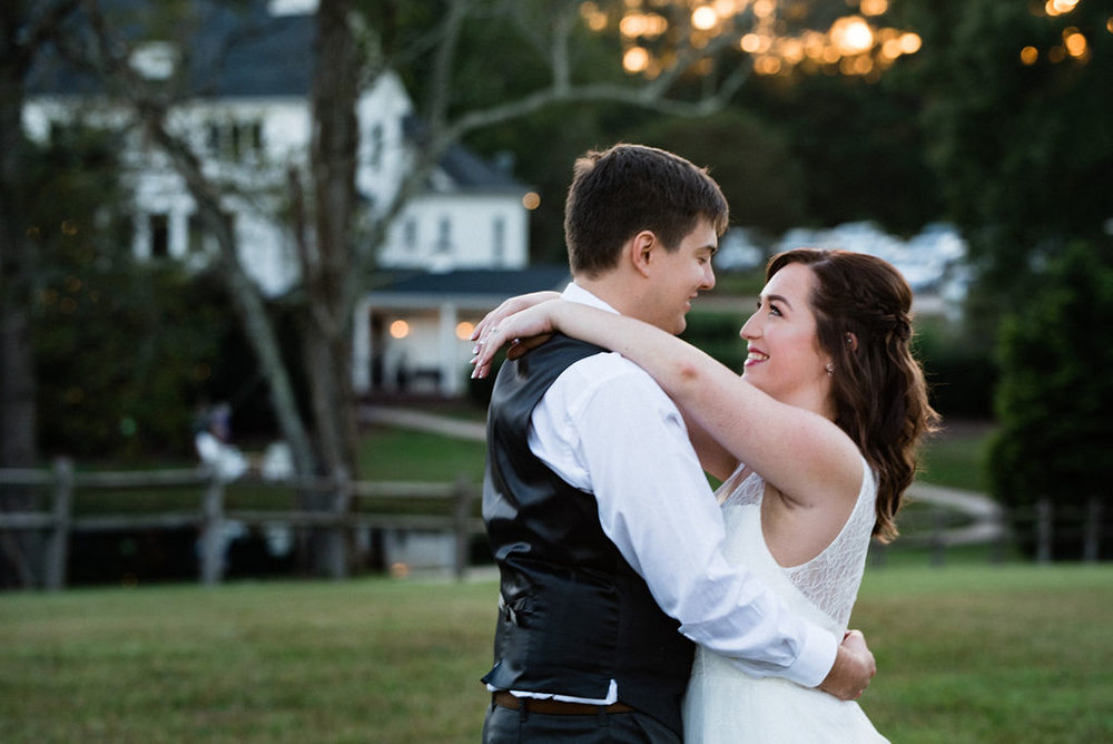 Bride and Groom Sunset Portraits at The Oaks at Salem Wedding in Apex, NC by Charlotte Wedding Photographers