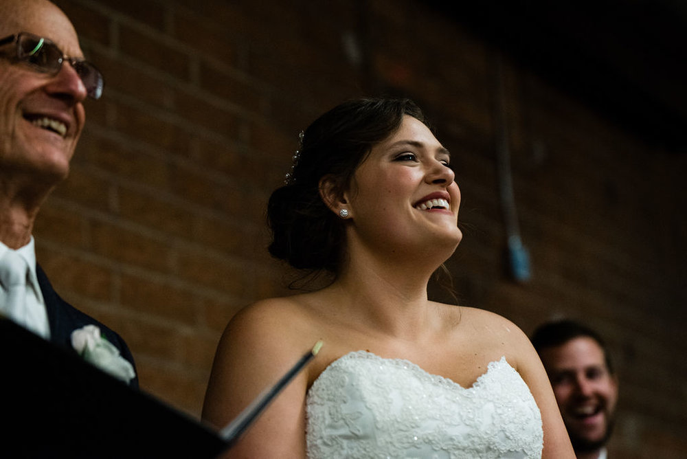 Bride Reaction at Triple C Barrel Room by Charlotte Wedding Photographers
