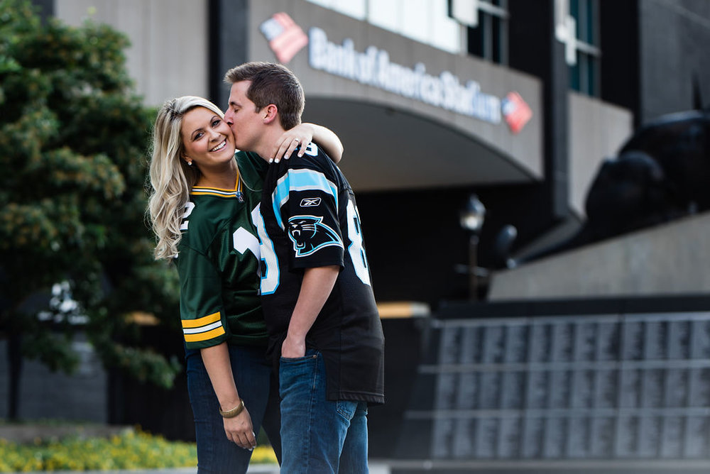 Uptown Charlotte Engagement Session at Bank of America Panthers Stadium by Charlotte Wedding Photographers