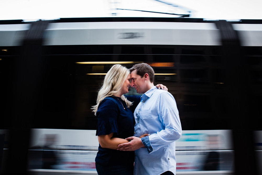 Lightrail Lynx Uptown Charlotte Engagement Session by Charlotte Wedding Photographers