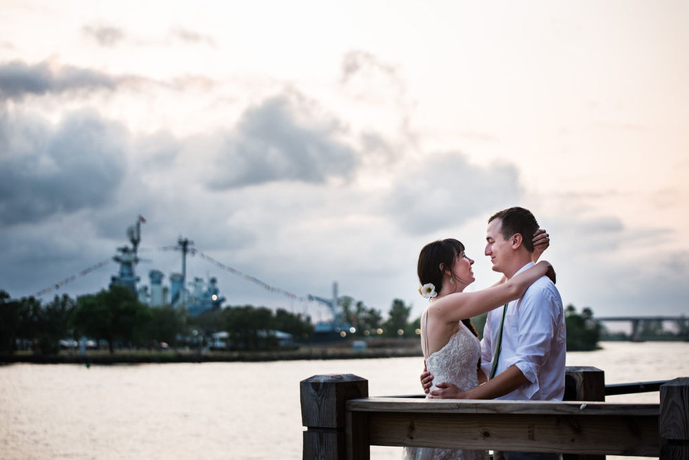 Bride and Groom Portraits on Boardwalk in Wilmington NC by Charlotte Wedding Photographers