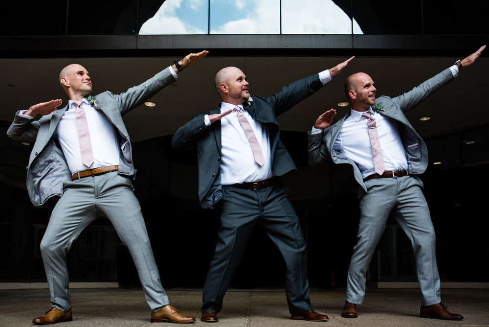 Groomsmen Bolt Pose by Charlotte Wedding Photographers