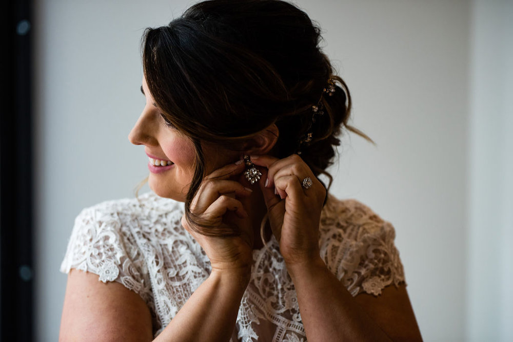 Bride Getting Ready at the Ivey’s Hotel by Charlotte Wedding Photographers