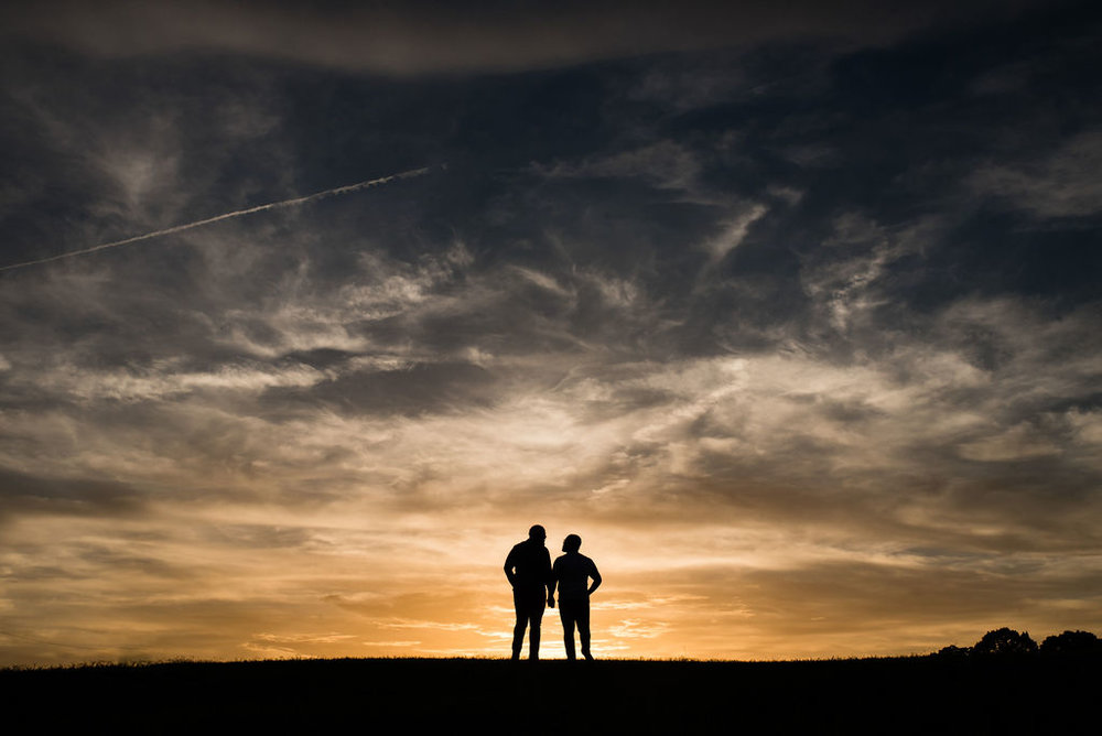 Same Sex Gay Couple Engagement Session Sunset Silhouette by Charlotte Wedding Photographers