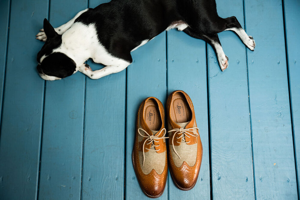 Groom shoe details and dog for Raleigh wedding by Charlotte Wedding Photographers