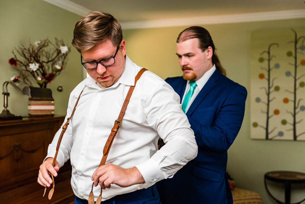 Groom getting ready for Raleigh wedding by Charlotte Wedding Photographers