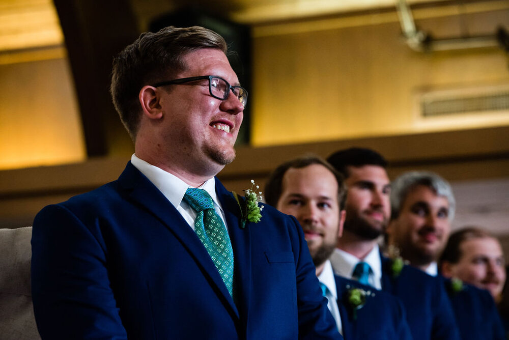 Groom at ceremony at Pleasant Grove United Methodist Church Raleigh wedding by Charlotte Wedding Photographers