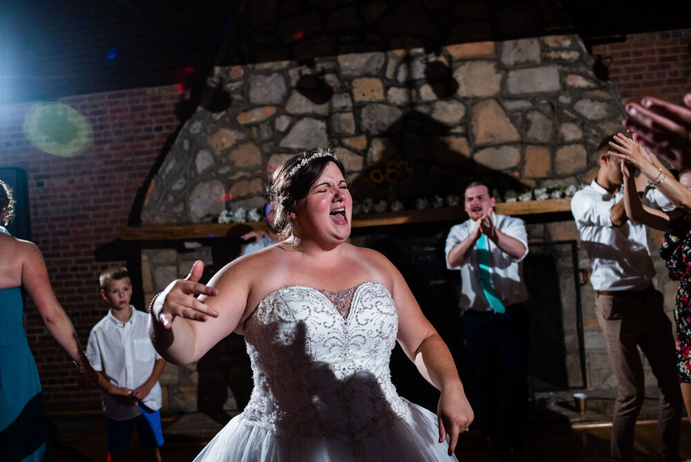 Reception dancing at Campbell Lodge Reception, Durant Nature Preserve, Raleigh wedding by Charlotte Wedding Photographers