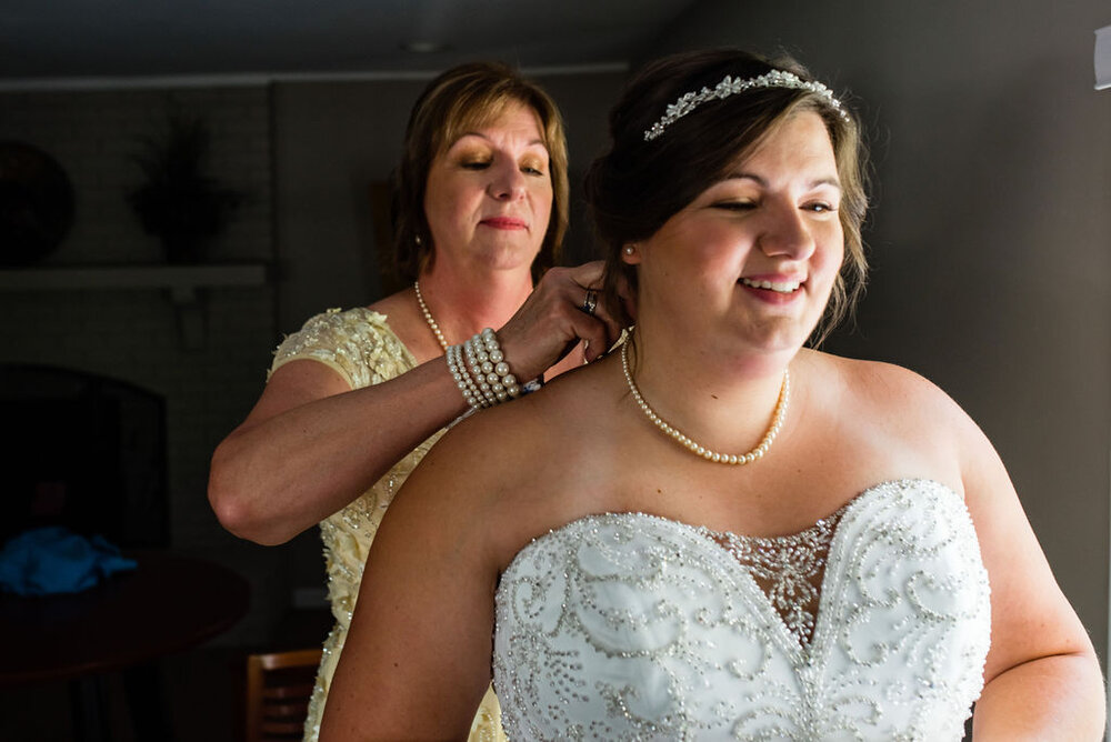 Bride getting ready at Pleasant Grove United Methodist Church Raleigh by Charlotte Wedding Photographers