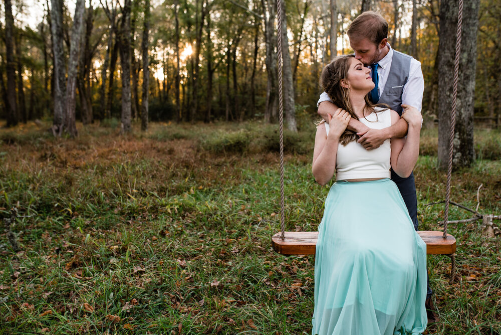 Green Omnivore Farm Engagement Session tree swing by Charlotte Wedding Photographers