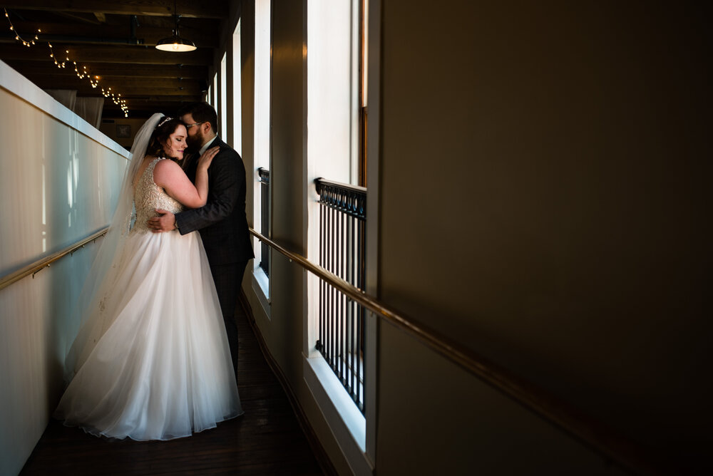 Fall Laboratory Mill Wedding bride and groom first look by Charlotte Wedding Photographers