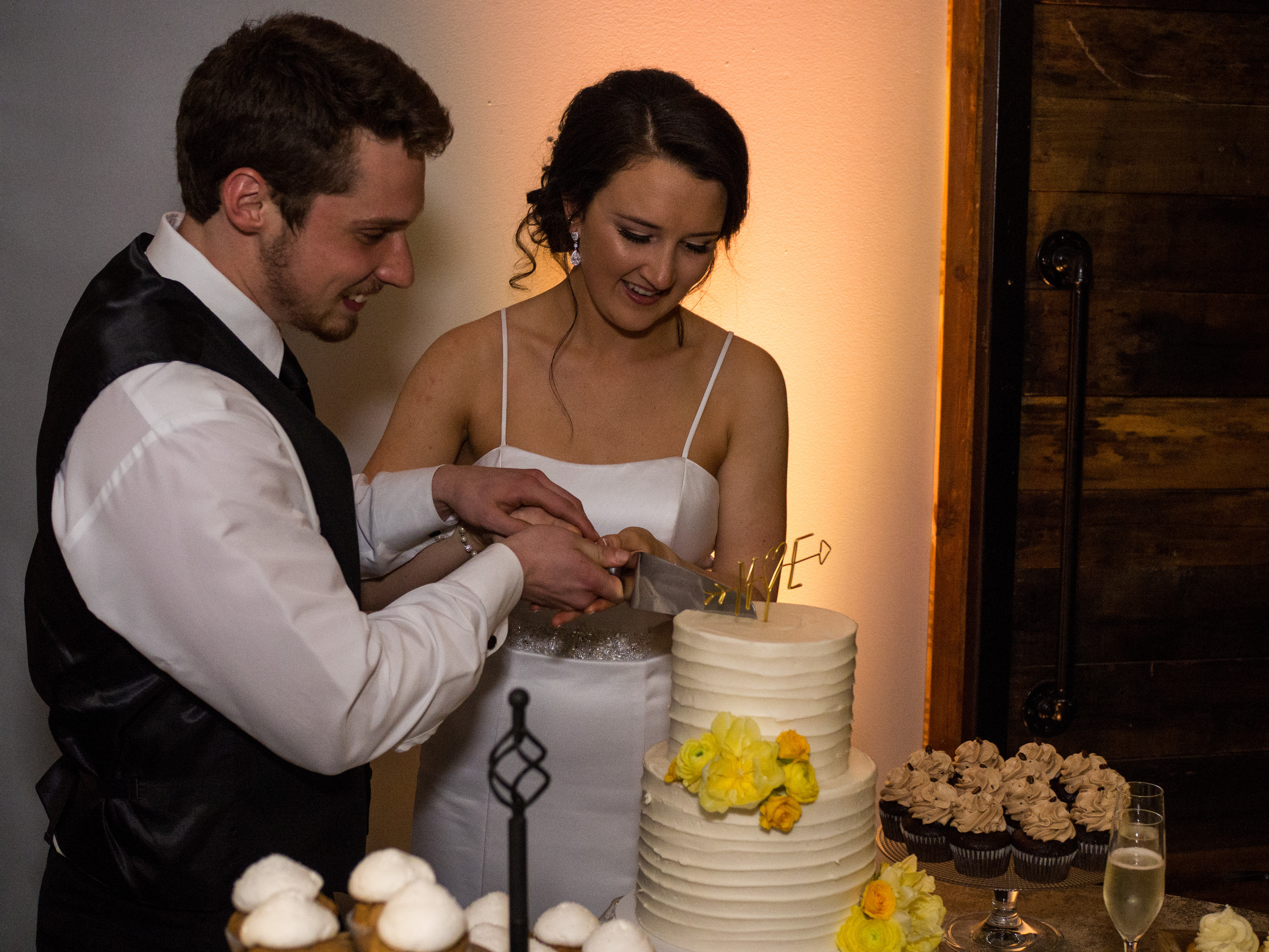Cake cutting during wedding at 214 Martin Street
