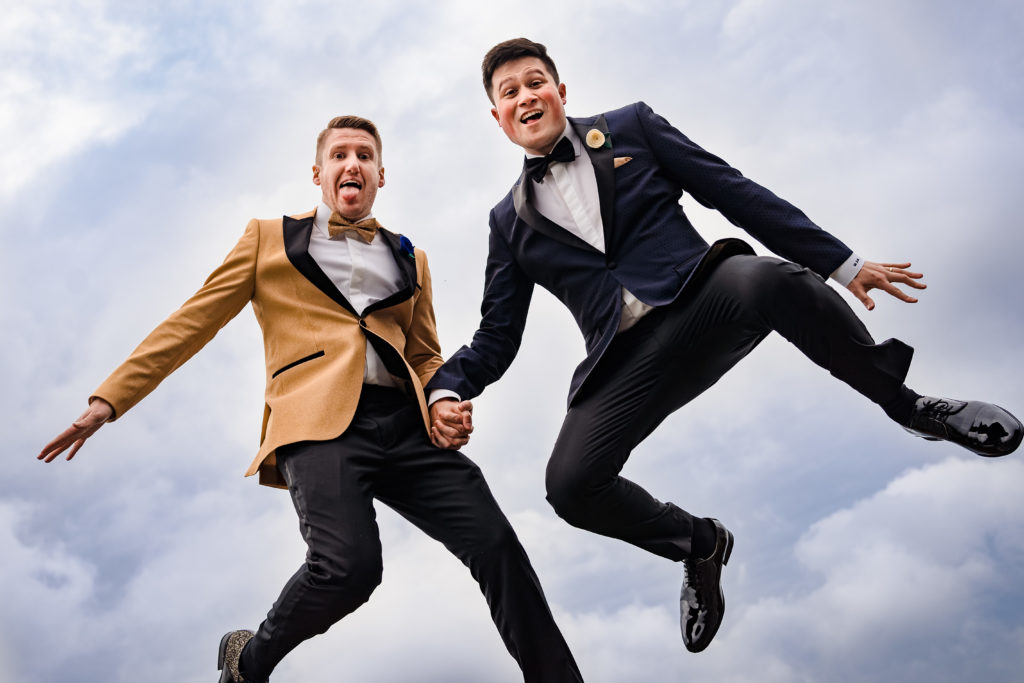 Fun LGBTQ Wedding poses - jump up in the air! 