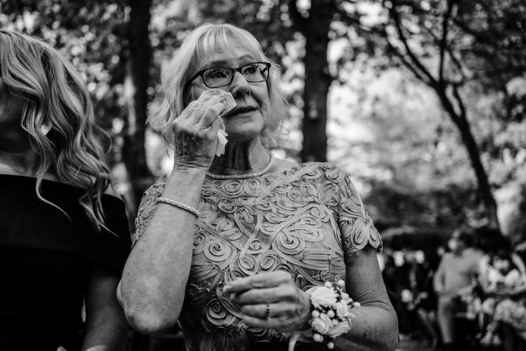 Emotional mother crying at wedding