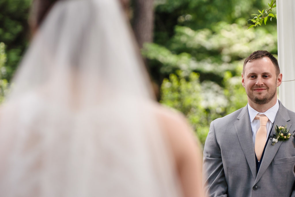 Groom seeing bride for first time during Whitehead Manor Wedding in Charlotte NC