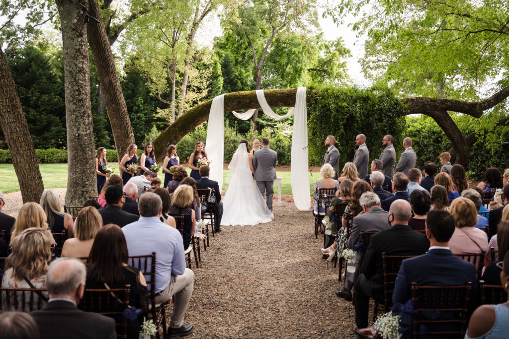 Overall image of outdoor ceremony during Whitehead Manor Wedding in Charlotte NC