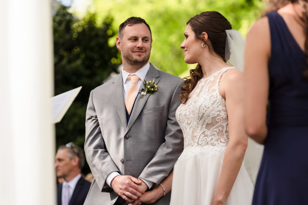 Bride and groom exchanging sweet looks during Whitehead Manor Wedding in Charlotte NC