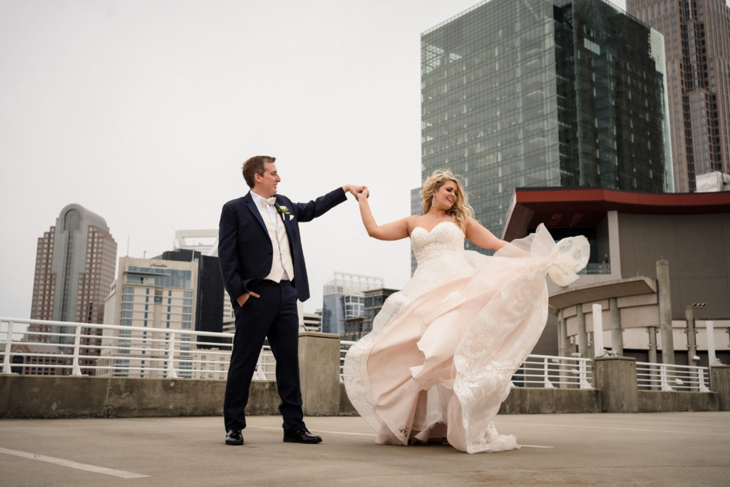 Rooftop wedding portrait on parking deck across from Springhill Suites in Uptown Charlotte