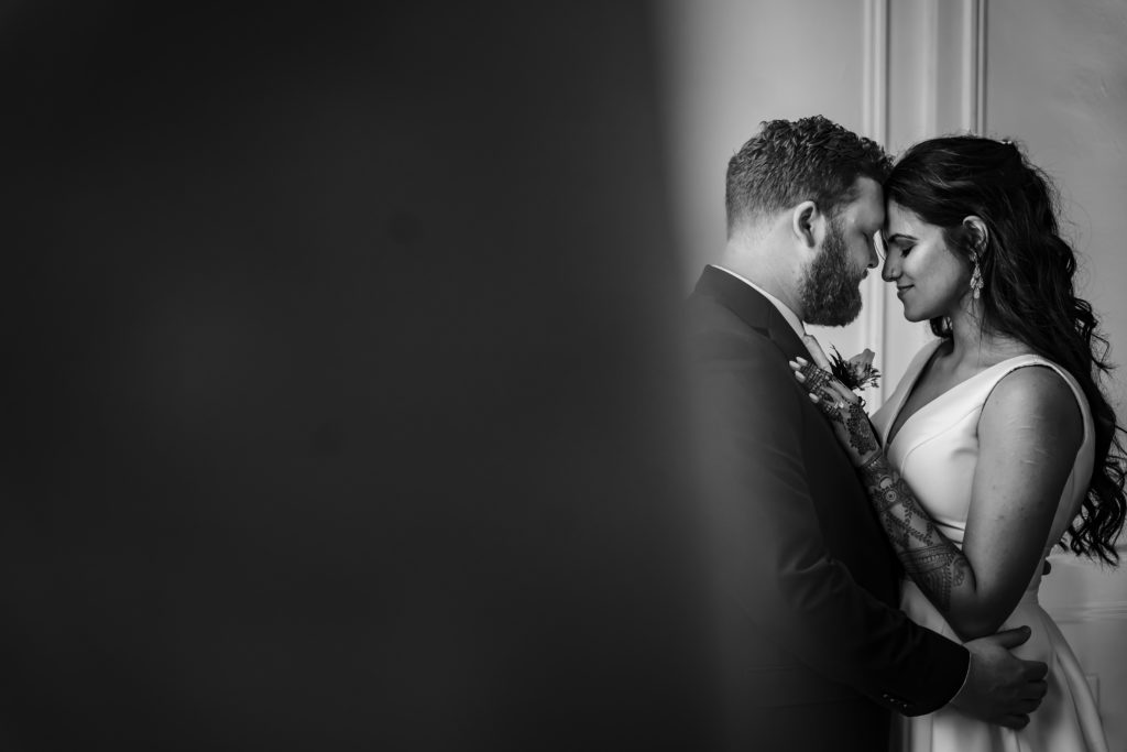 Black and White bride and groom portrait at Indian Fusion wedding in Charlotte