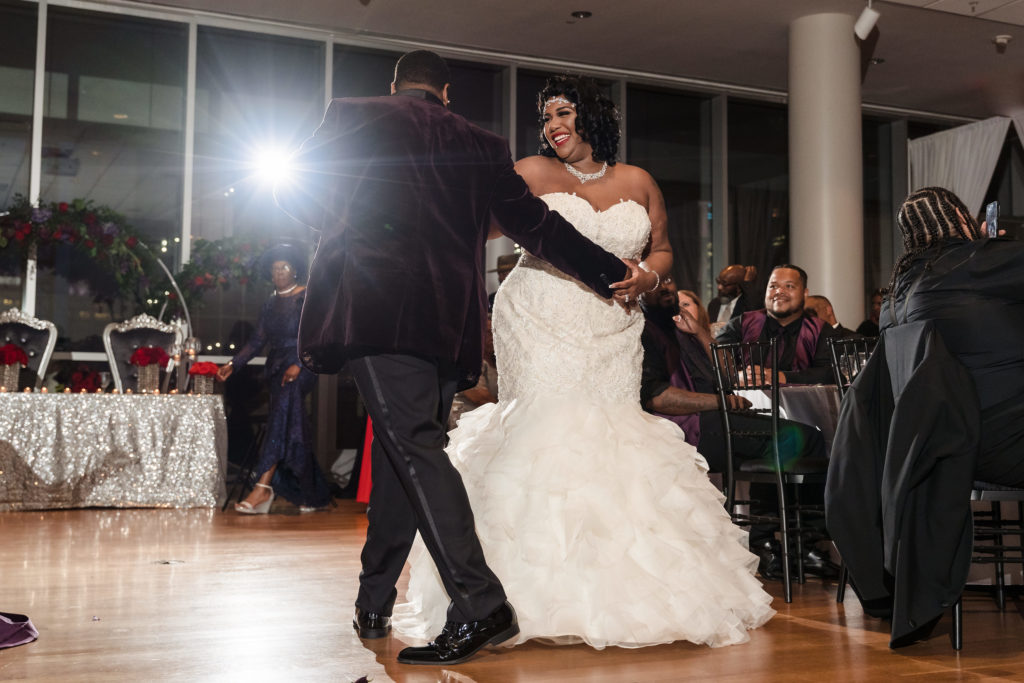 Bride and Groom first dance after their wedding in the reception space at the Mint Museum Uptown Charlotte