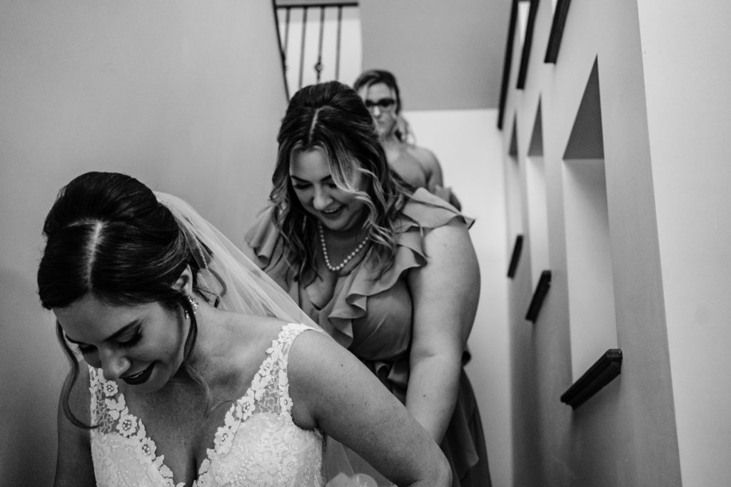 Bride heading down the stairs to go to her wedding.