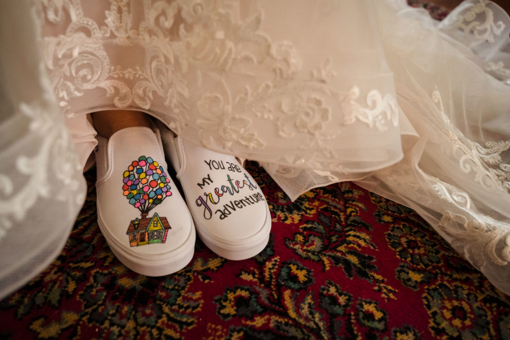 Personalized wedding shoes featuring a quote from a Disney Pixar movie