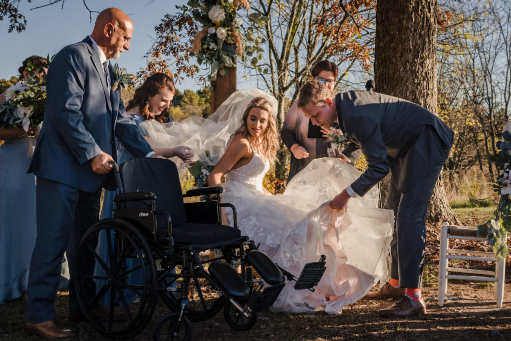 Bride moves from wheelchair to chair for wedding ceremony