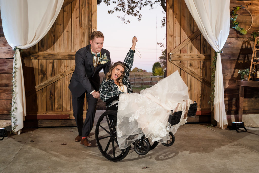 Entering the wedding reception by doing a wheelie in a wheelchair