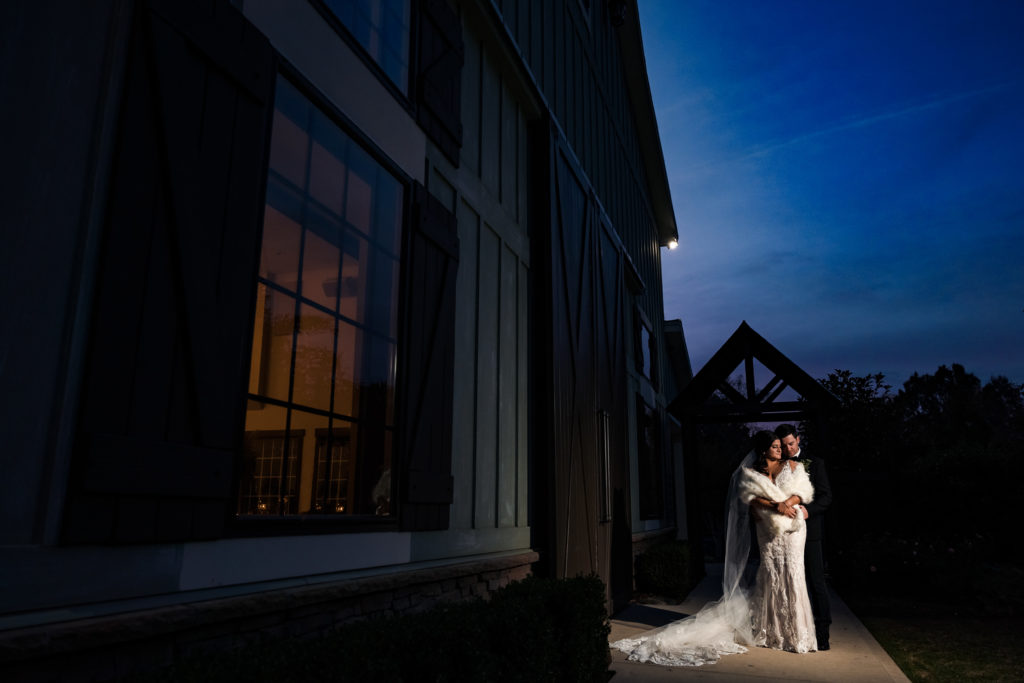 Wedding portrait at dusk outside of Sweet Magnolia Estate in Charlotte NC