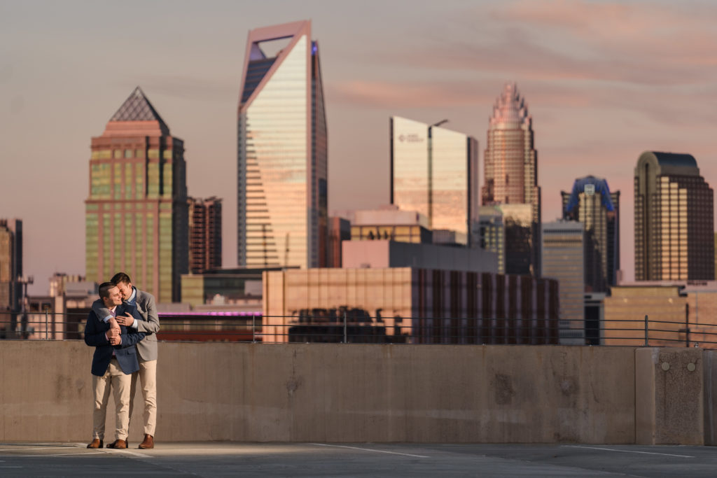 engagement photos with Charlotte skyline from South End
