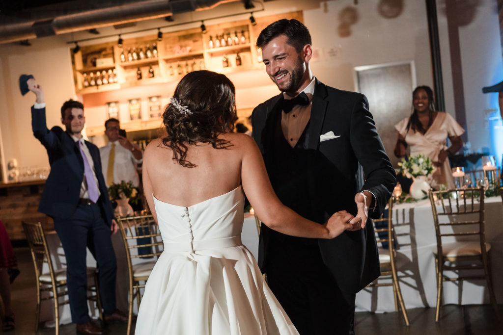 Newlyweds first dance at Barrel Room at Triple C South End Charlotte Brewery Wedding