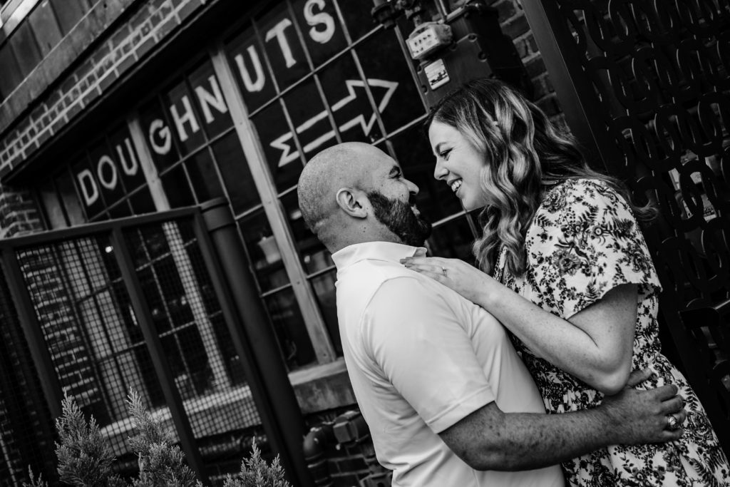 Charlotte engagement session in front of Pepperbox donuts
