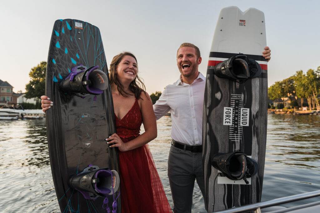 Couple prepares for wakeboarding engagement session photos
