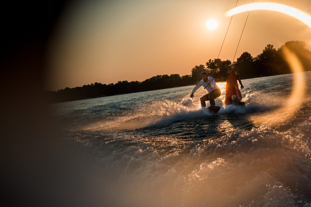 Sun flare Silhouette wakeboarding engagement session photos