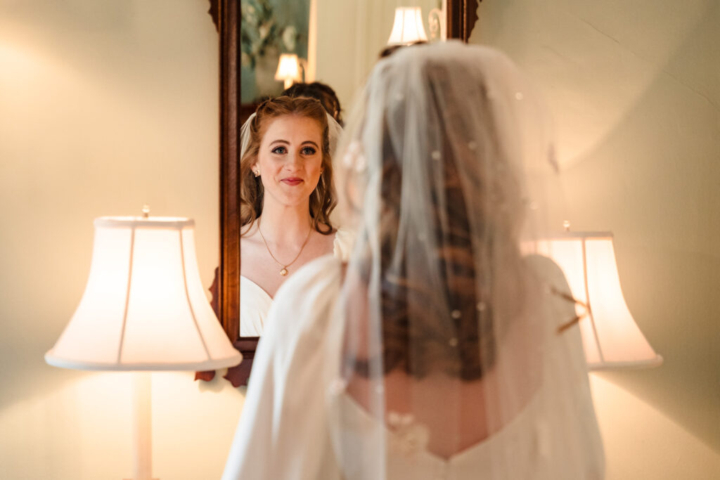 Bride reflection at romantic Morehead Inn wedding