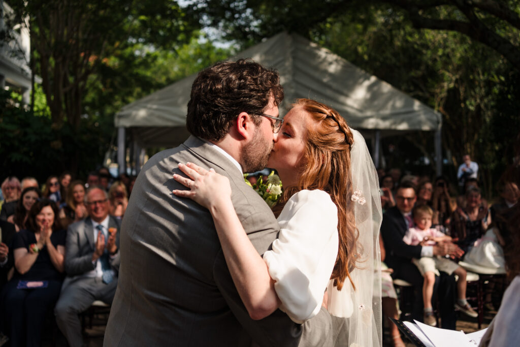 romantic Morehead Inn wedding ceremony first kiss
