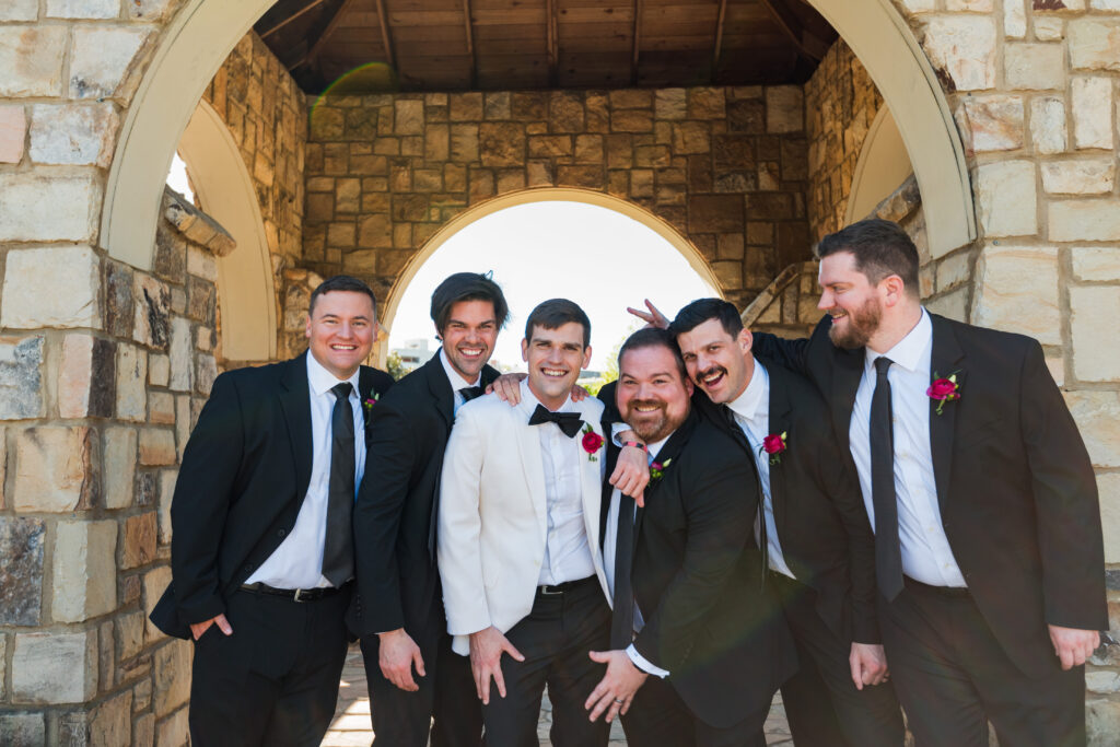 Groom and Groomsmen at Pearl Park in Charlotte before the wedding during spring