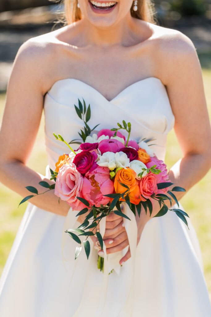 Colorful flowers make up the perfect spring bouquet at Pearl Park in Charlotte before the wedding