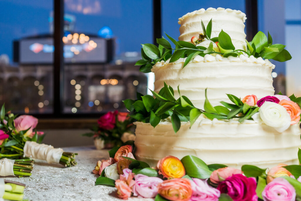 You can incorporate spring flowers during your wedding in Charlotte easily by including them in your cake layers