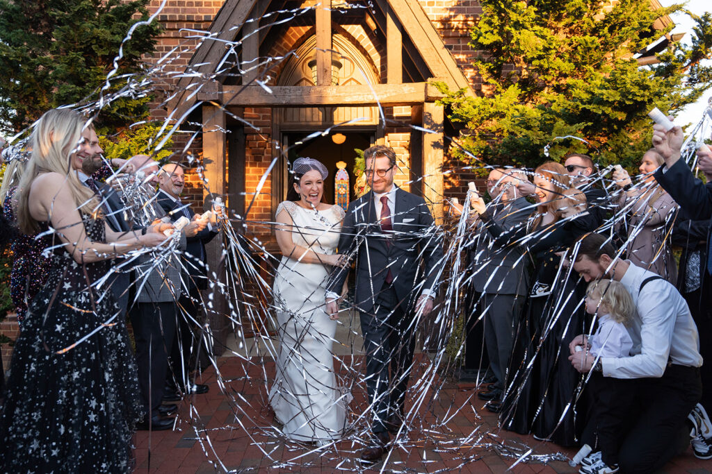 New Years Eve Streamer Exit with Bride and Groom in front of St. Mary's Chapel in Charlotte NC