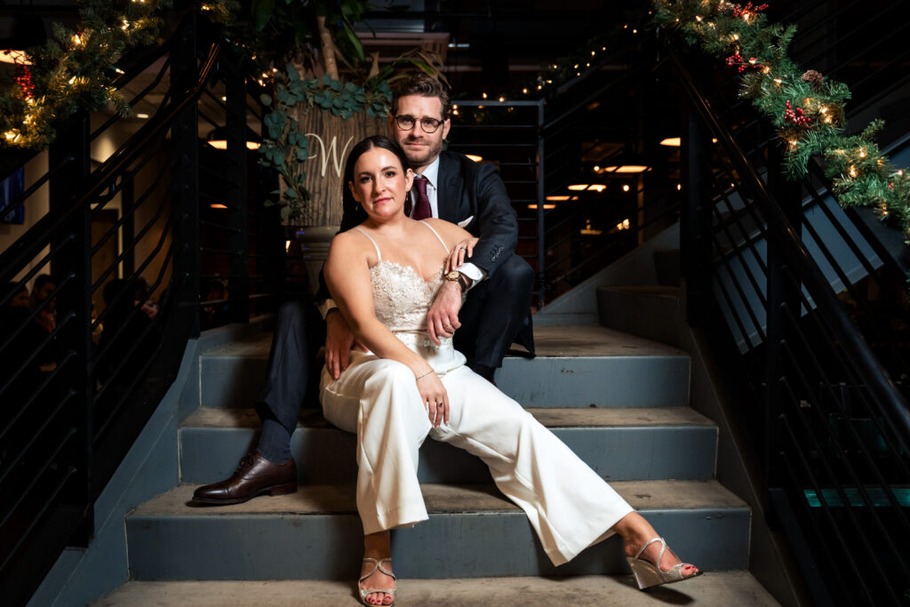 Editorial Wedding Photography on staircase at Trolley Barn celebrating New Years Eve in Charlotte North Carolina