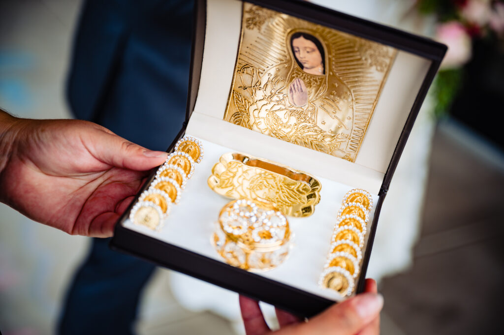 Thirteen marriage coins given to the bride and groom as a tradition to uphold for mexican weddings