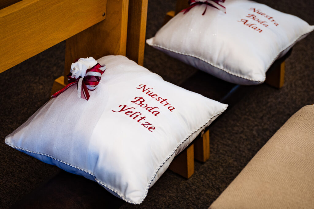 Kneeling pillows for a mexican wedding given as a gift to the bride and groom, a common tradition for the ceremony