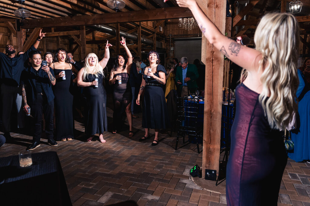 karaoke sing along at Pleasant Grove Farm wedding in Charlotte